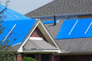 What is roof tarping? - Resilient Roofing